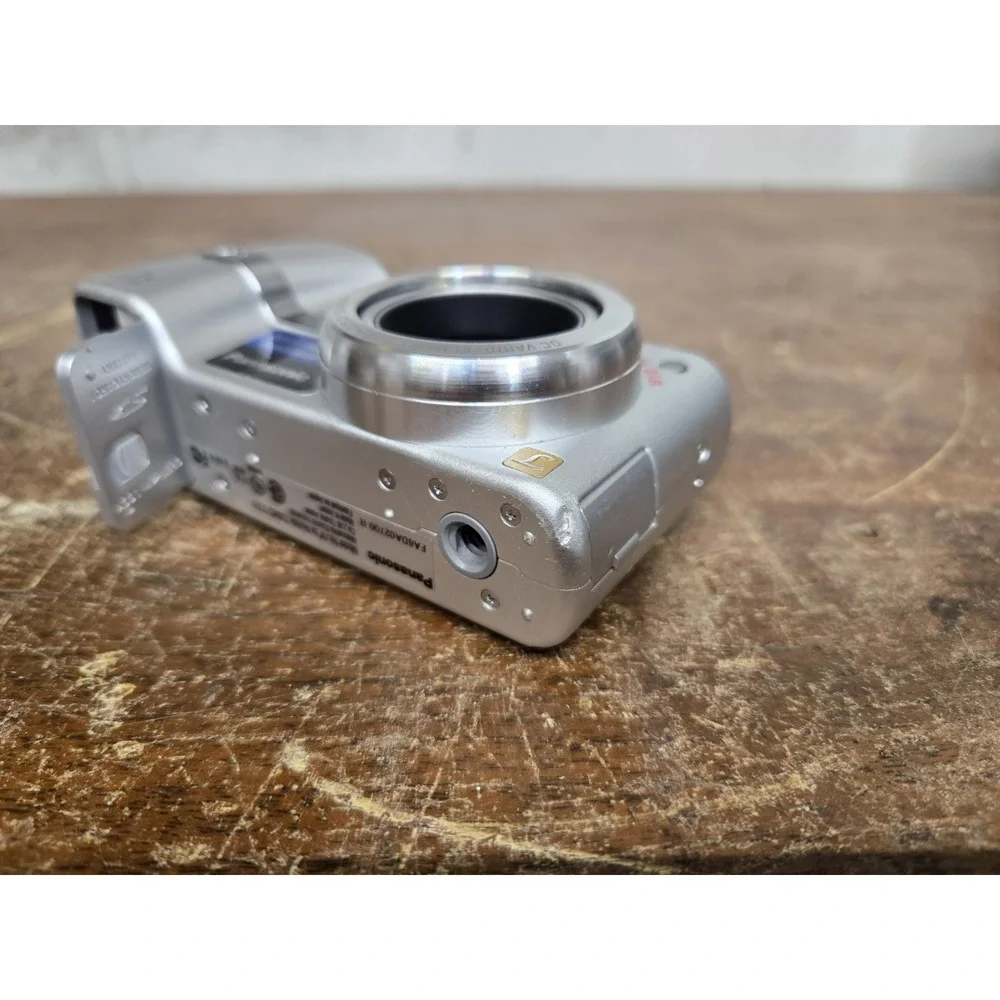 Panasonic Lumix DMC-TZ1 5MP CCD Digital Camera Silver 10x Zoom Tested Working